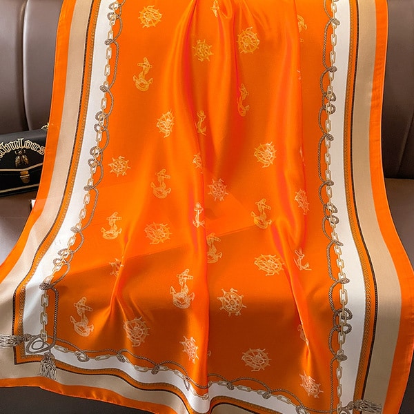 O1CN01IGXu0R1LoVwItdYne_948541346-0-cib.600x600.jpg Silk Satin Orange Western Style Long Scarf - Image 1